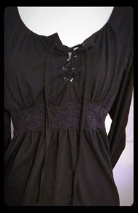 Cute black pheasant style top. Womans size medium.